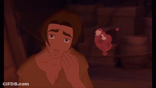 Man Holding Small Object GIF