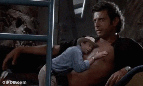 Man Holding Smaller Man GIF