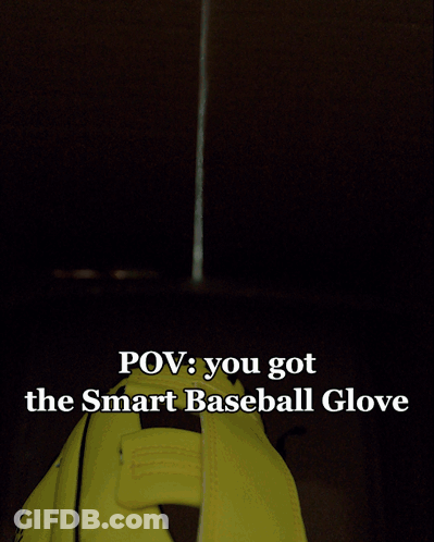 Man Holding Smart Baseball Glove GIF