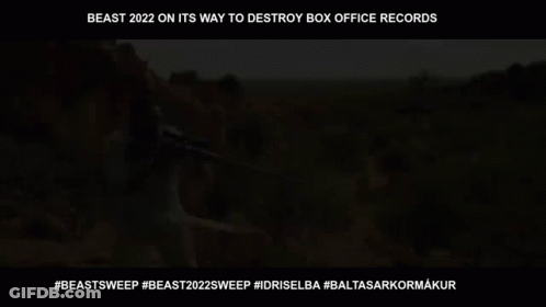 Man Holding Sniper Rifle In Desert GIF