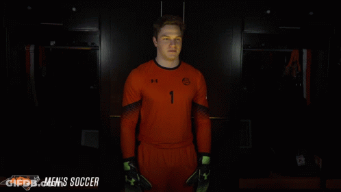 Man Holding Soccer Ball Men's Soccer GIF