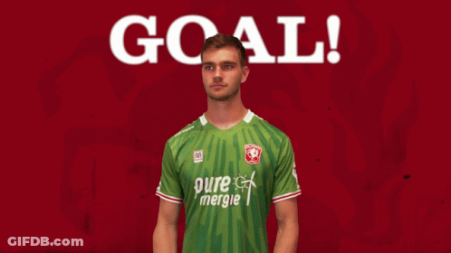Man Holding Soccer Ball On Red Background Saying Goal GIF