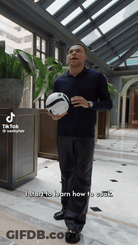Man Holding Soccer Ball Says I Start To Learn How To Cook GIF
