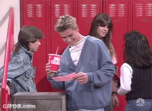 Man Holding Soda And Paper Before Group GIF