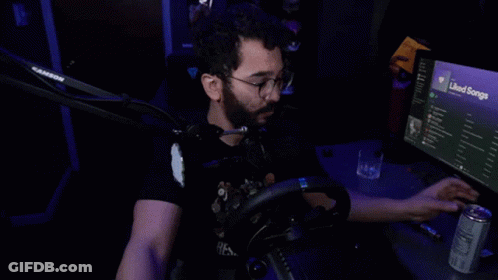 Man Holding Soda Can And Liked Songs Screen GIF