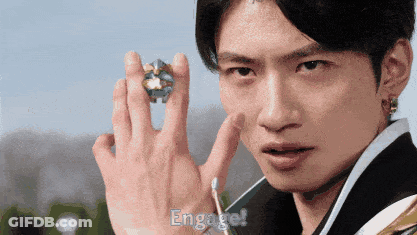 Man Holding Something Saying Engage GIF