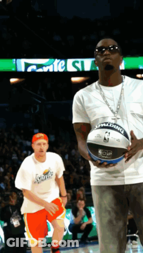 Man Holding Spalding Basketball GIF