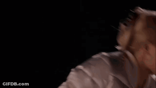 Man Holding Spoon In Mouth In Woods GIF
