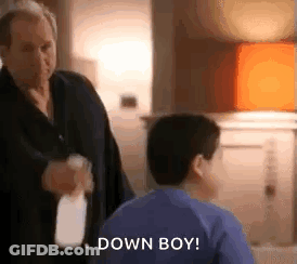 Man Holding Spray Bottle Next To Boy GIF