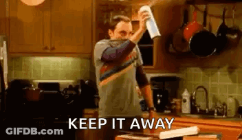 Man Holding Spray Bottle Saying Keep It Away GIF