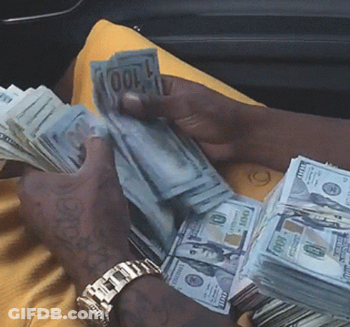 Man Holding Stack Of 100 Dollar Bills GIF