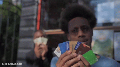 Man Holding Stack Of Credit Cards Including Chase GIF