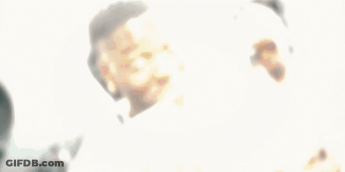 Man Holding Stack Of Money With Number 100 GIF