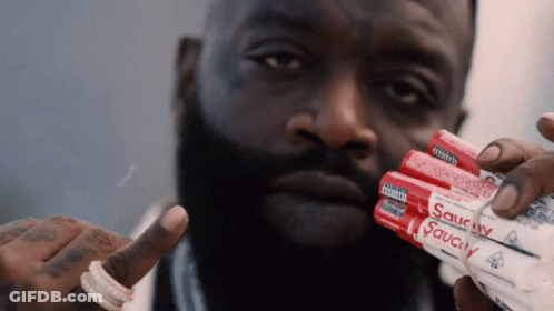 Man Holding Stack Of Saucy Sauce GIF