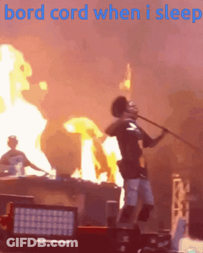 Man Holding Stick By Fire Bord Cord When I Sleep GIF