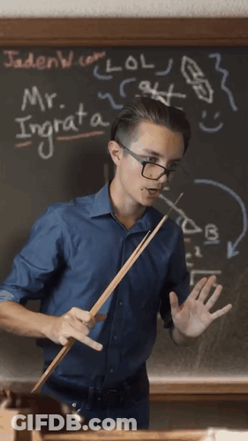 Man Holding Stick In Front Of Blackboard With Mr. Ingrata GIF