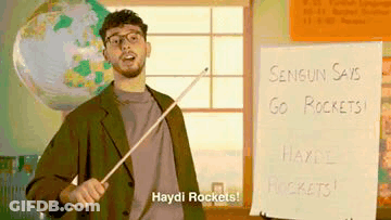 Man Holding Stick In Front Of Haydi Rockets Sign GIF