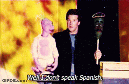 Man Holding Stick Saying Well I Don't Speak Spanish GIF