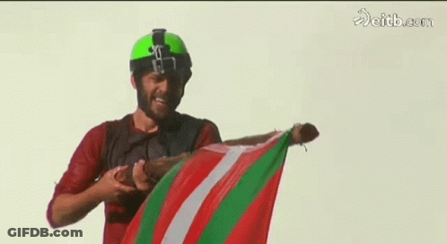Man Holding Stick Up With Weirdb.com GIF