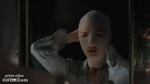 Man Holding Stick With Eyes Closed GIF