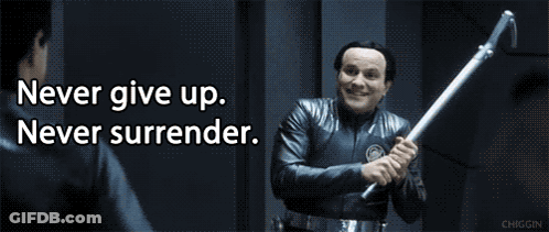 Man Holding Stick With Never Give Up Surrender GIF
