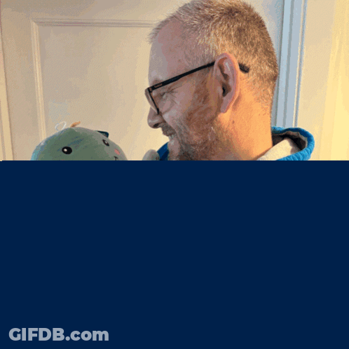 Man Holding Stuffed Animal Mighty Lancer Games GIF
