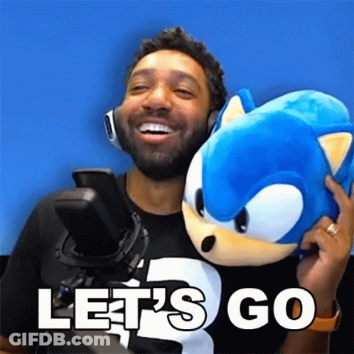 Man Holding Stuffed Sonic The Hedgehog Saying Let's Go GIF