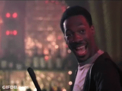 Man Holding Sword And Smiling GIF