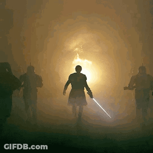 Man Holding Sword In Front Of Bright Light GIF