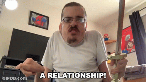 Man Holding Sword Saying A Relationship GIF