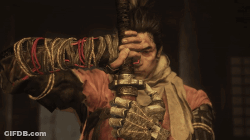 Man Holding Sword With Scarf And Gloves GIF