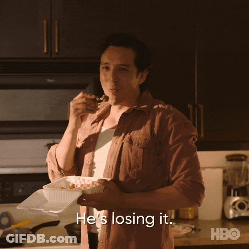 Man Holding Takeout Container Saying He's Losing It GIF