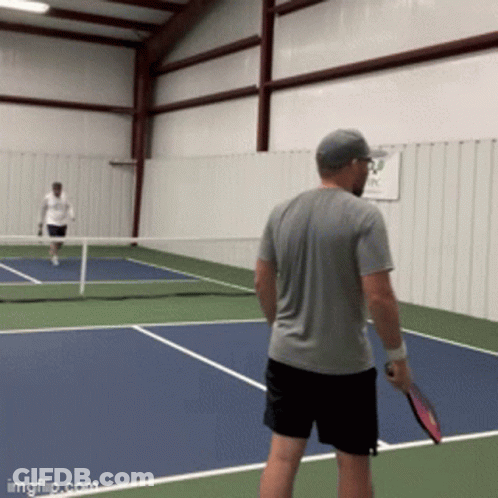 Man Holding Tennis Racket GIF