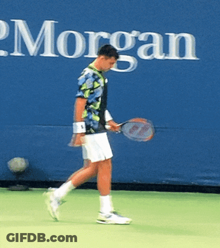 Man Holding Tennis Racquet GIF
