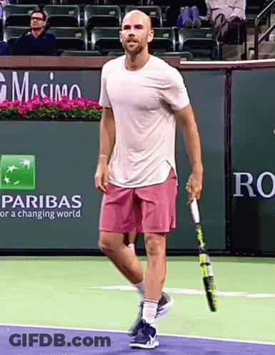 Man Holding Tennis Racquet By Pariba Advertisement GIF