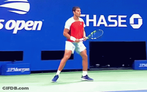 Man Holding Tennis Racquet Chase Advertisement GIF