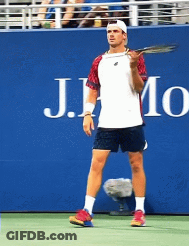 Man Holding Tennis Racquet GIF