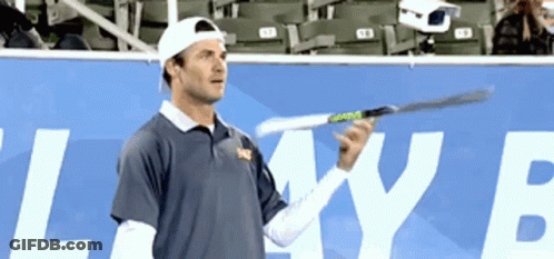Man Holding Tennis Racquet In Front Of Lake Sign GIF
