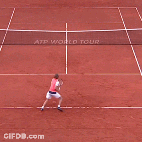 Man Holding Tennis Racquet GIF