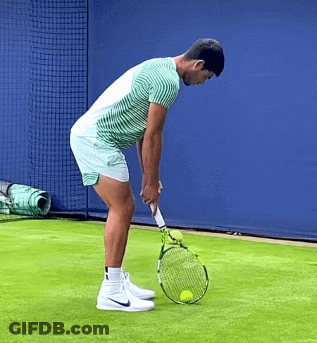 Man Holding Tennis Racquet GIF