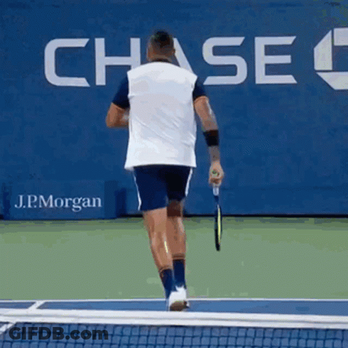 Man Holding Tennis Racquet GIF