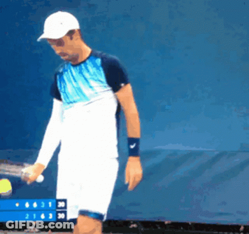 Man Holding Tennis Racquet GIF