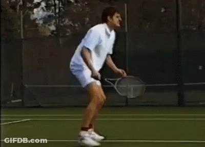 Man Holding Tennis Racquet On Court GIF