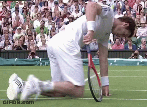 Man Holding Tennis Racquet On Knees GIF