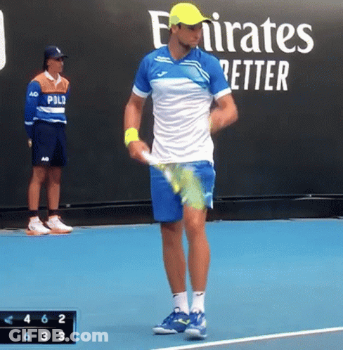 Man Holding Tennis Racquet On Tennis Court With Emirates Better Sign GIF