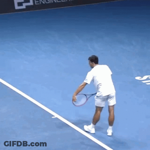 Man Holding Tennis Racquet GIF