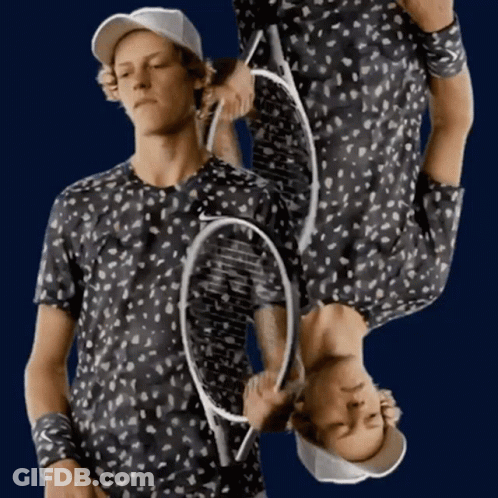 Man Holding Tennis Racquet Upside Down GIF