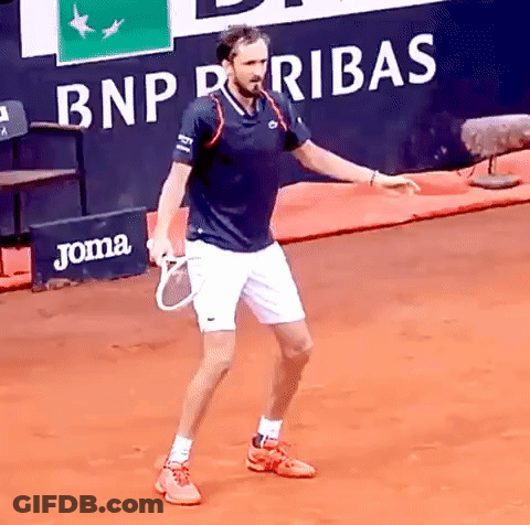 Man Holding Tennis Racquet With BNP Paribas Ad GIF