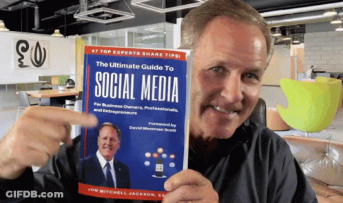 Man Holding The Ultimate Guide To Social Media GIF
