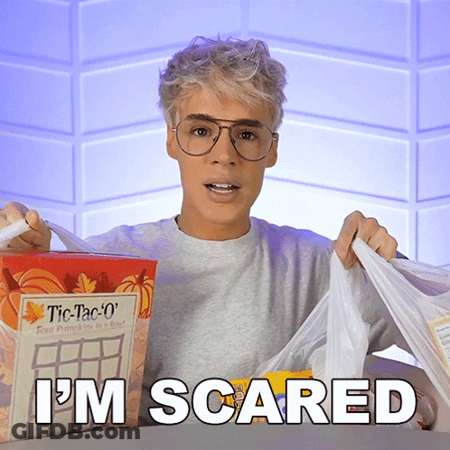 Man Holding Tic Tac O's And Food Saying I'm Scared GIF